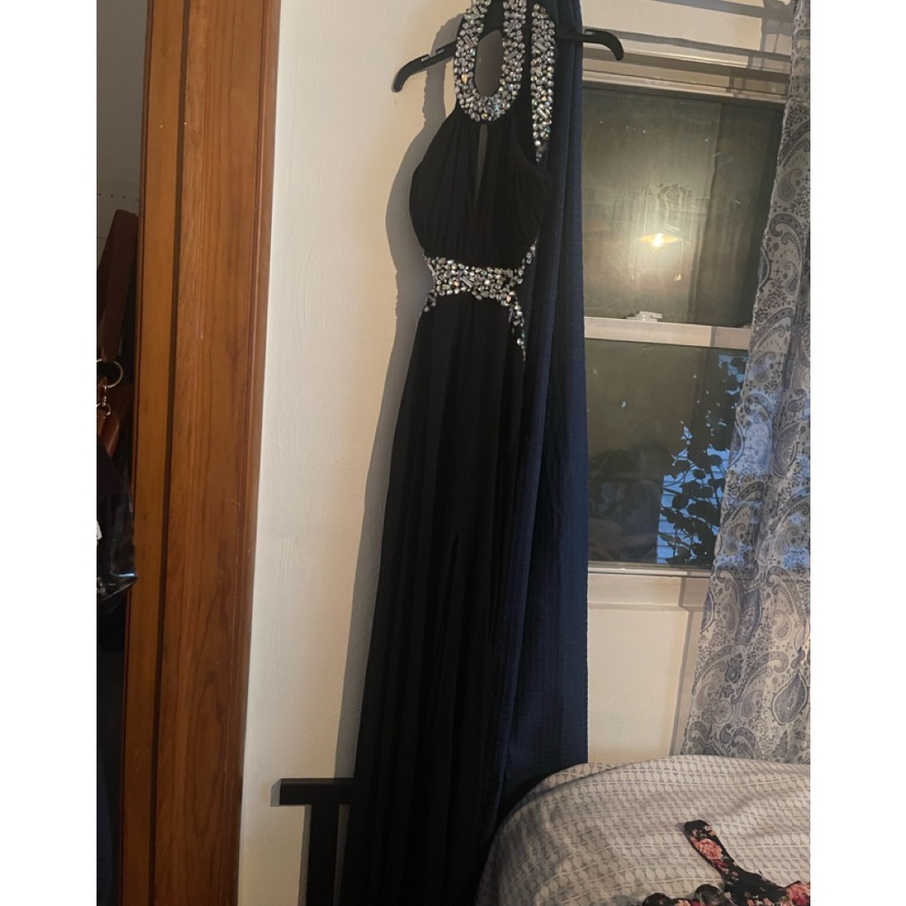 Long prom dress with a lot of jewelry beads